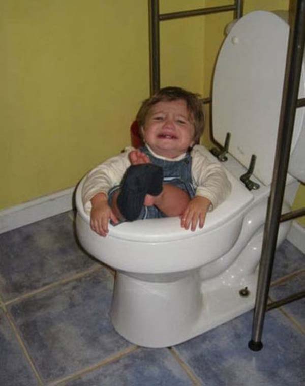 funny child stuck in toilet photo
