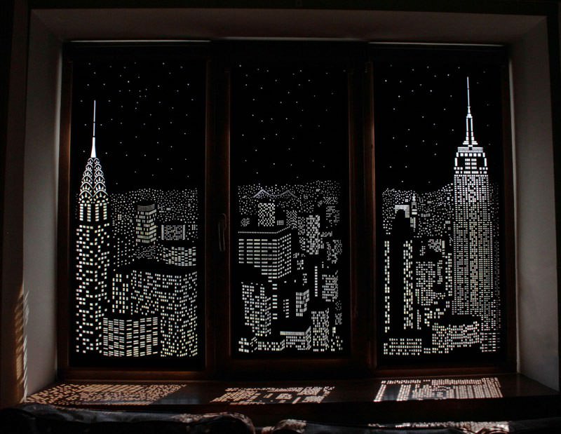 intricately cut blinds show iconic cityscapes at night by holeroll 1
