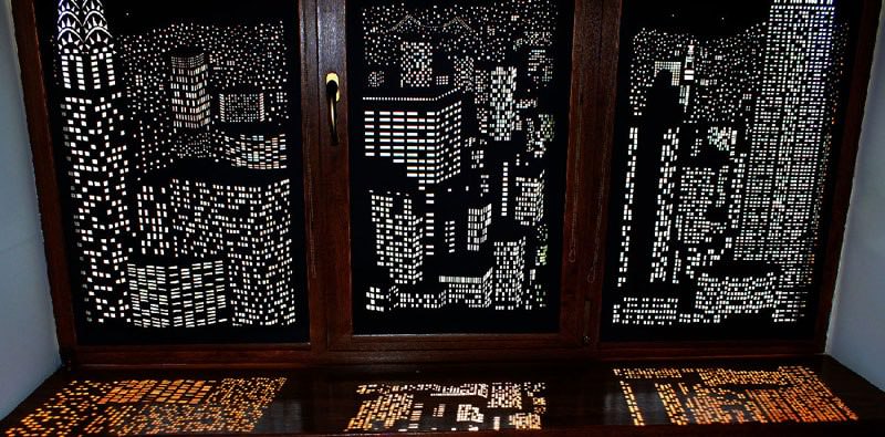intricately cut blinds show iconic cityscapes at night by holeroll 2