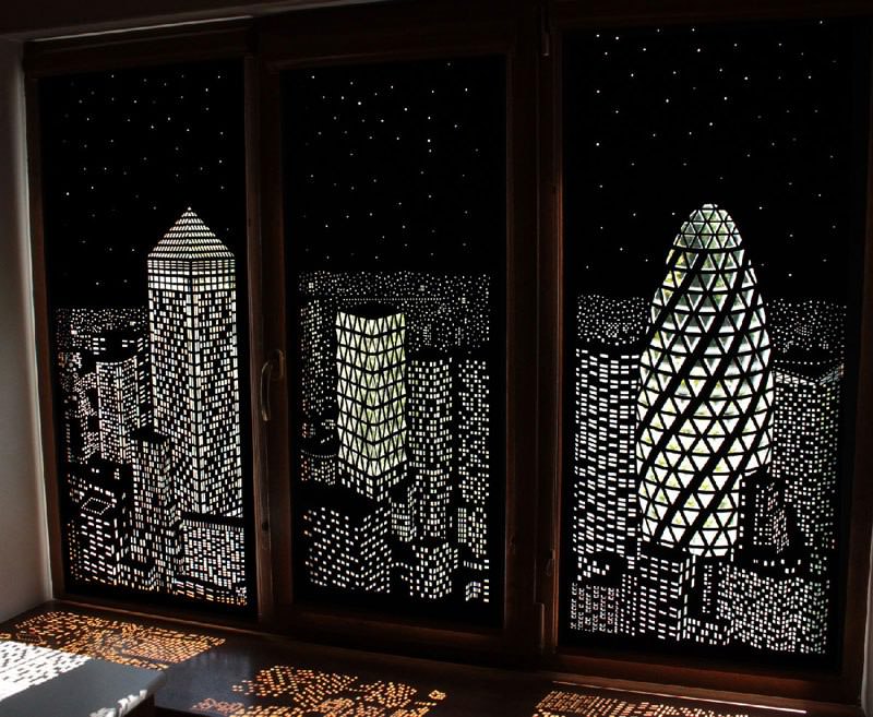 intricately cut blinds show iconic cityscapes at night by holeroll 5
