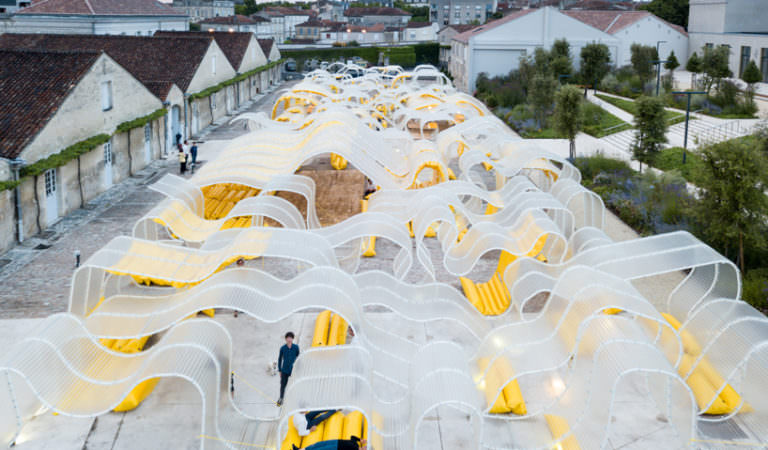 A Colorful Confluence of A Courtyard with Transparent Pavilion