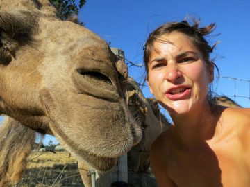 selfie extra woman with camel